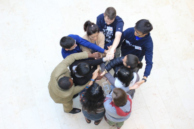 A group of people participating in an intercultural activity